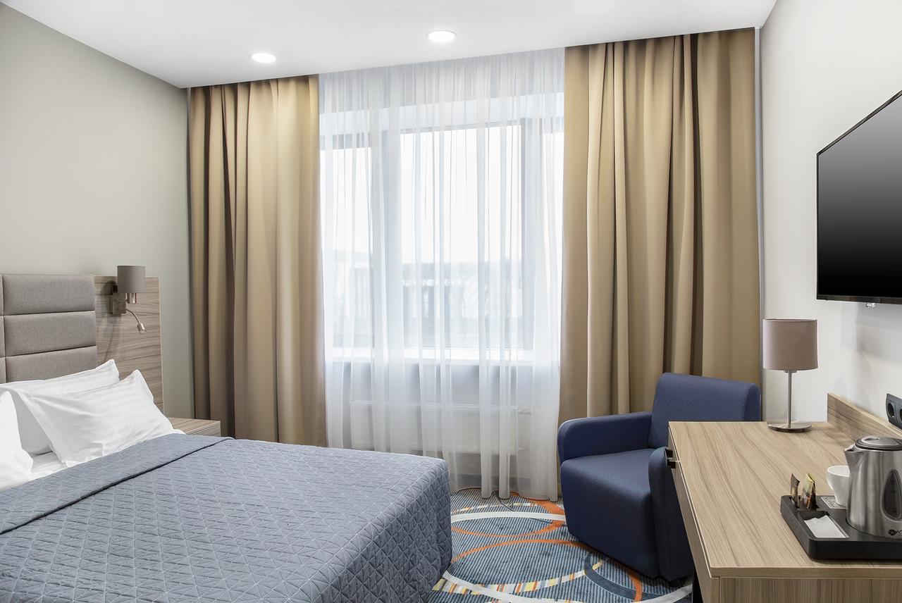 Willing Hotel Minsk Buitenkant foto