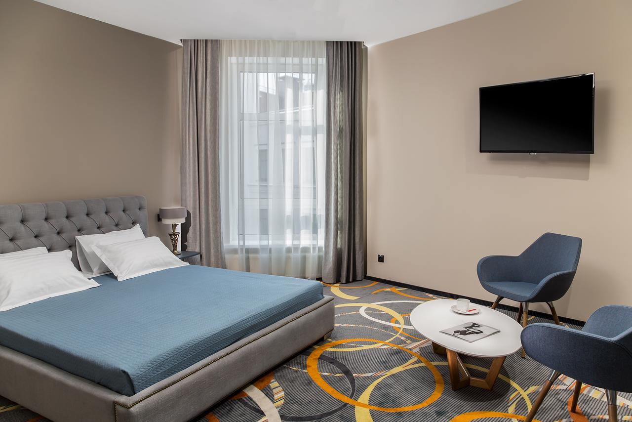 Willing Hotel Minsk Buitenkant foto