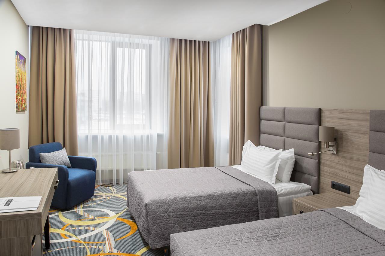 Willing Hotel Minsk Buitenkant foto