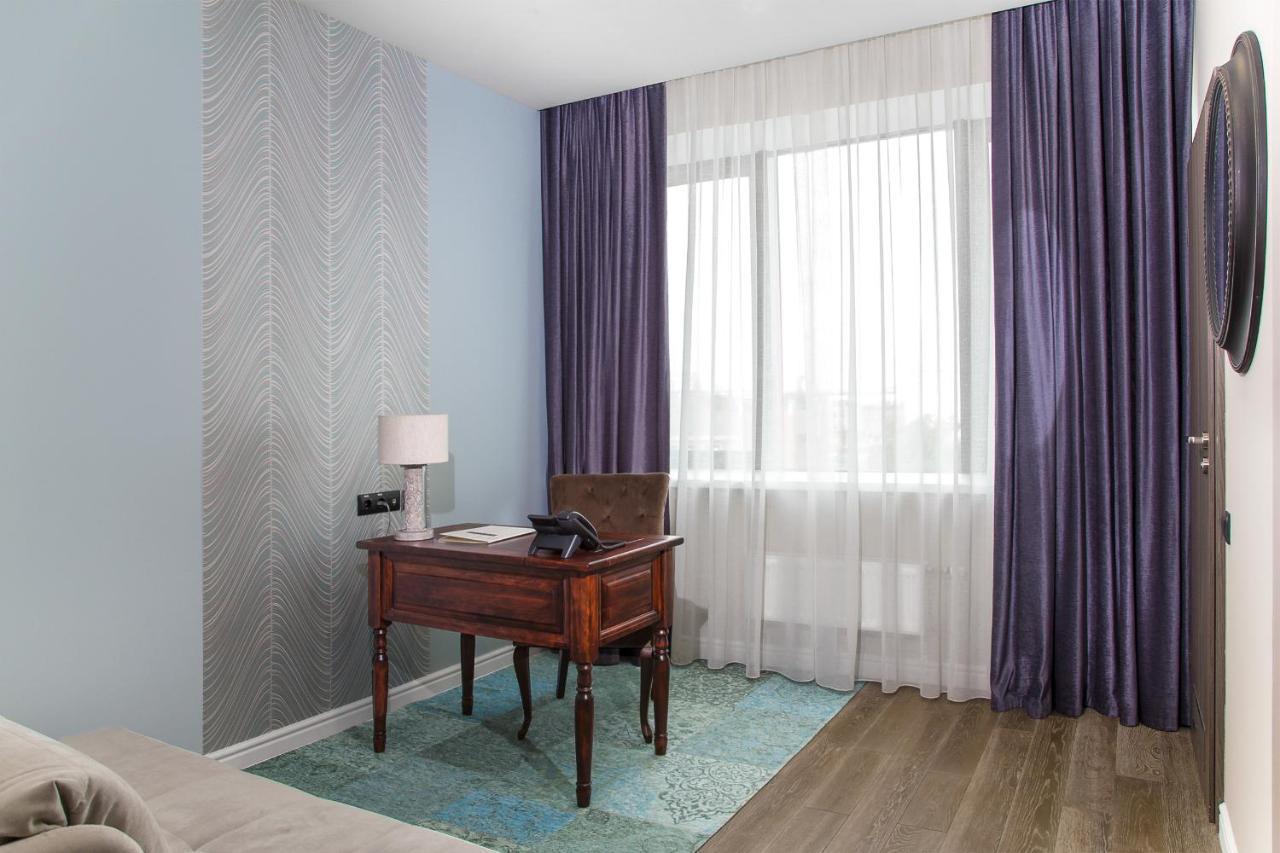 Willing Hotel Minsk Buitenkant foto